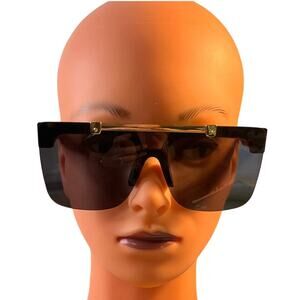 Zero UV Black Flip sunglasses with gold accents